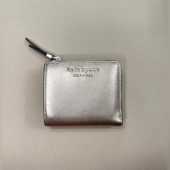 kate spade Handbags - Kate Spade Rose Gold Metallic Wallet NWT